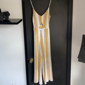 Yellow, white, and black one piece pant jumpsuit